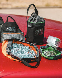 Thumbnail for CYNCH jar with its sorting mat and bags on a red truck